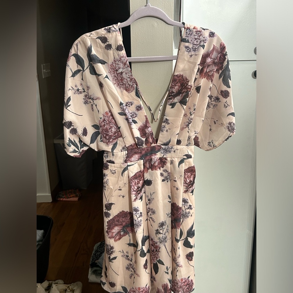 Floral romper. Low back. Worn once